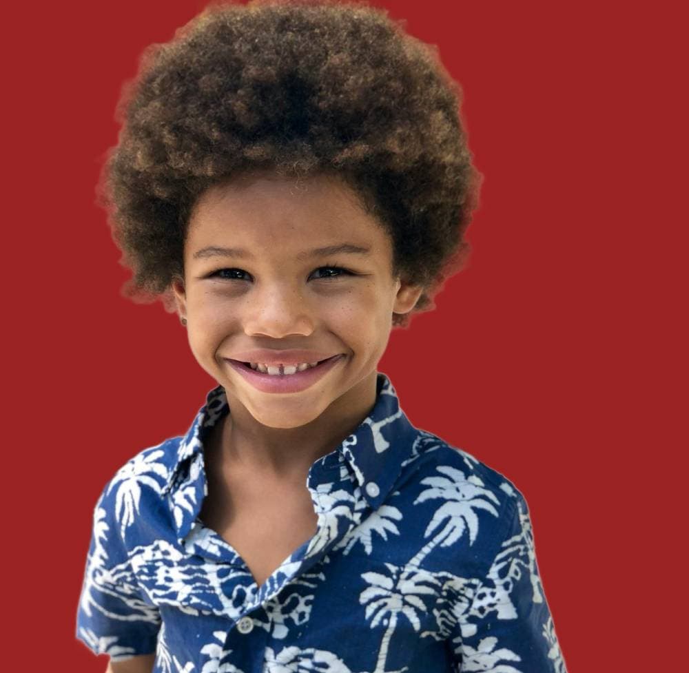 Young boy with bright confident smile